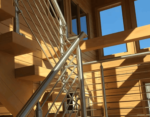 Image of stairs on the inside of an Enertia home. 